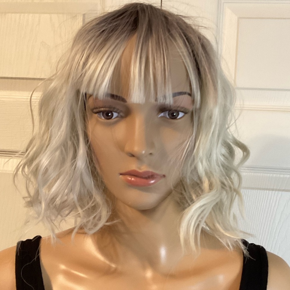 Brown to blonde, ombre synthetic wig with bangs.